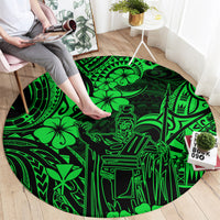 Green round Polynesian pattern carpet with outlined tribal warrior scene, black accents