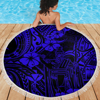 Navy blue round beach blanket with Polynesian pattern and white fringe edge
