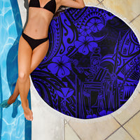 Navy blue round beach blanket with Polynesian pattern and white fringed border