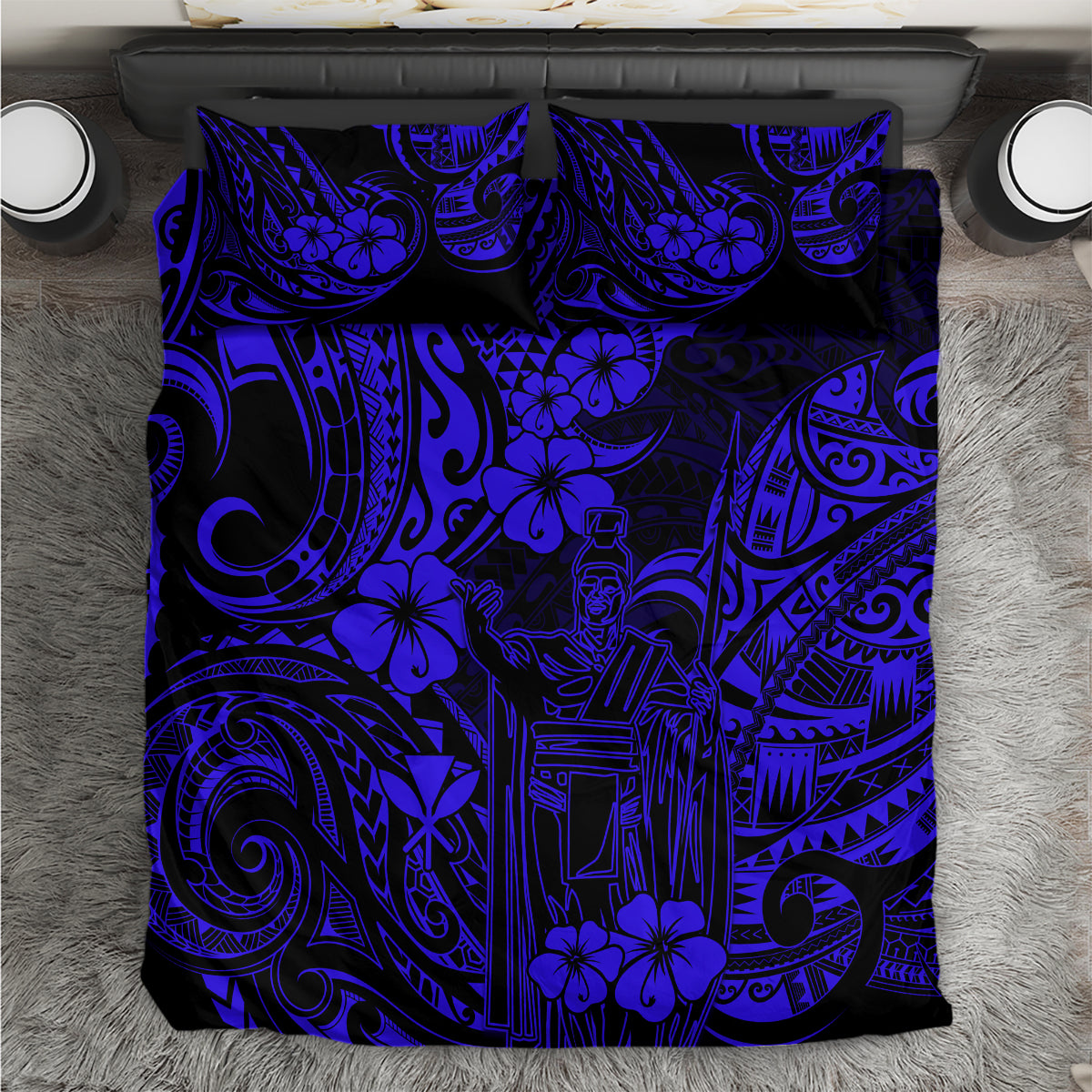 Navy and blue Polynesian patterned bedding comforter with floral and geometric motifs