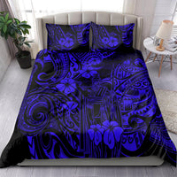 Navy and blue Polynesian patterned bedding set with matching pillow shams and comforter