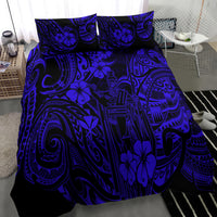 Navy and blue Polynesian patterned bed set with comforter and two coordinated pillow shams