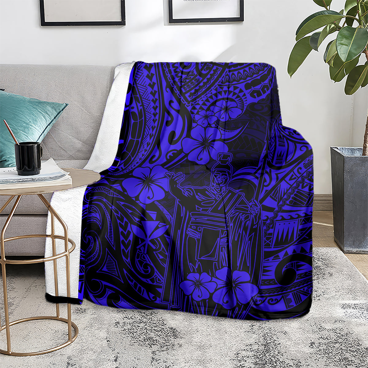 Navy blue Polynesian pattern blanket with floral and geometric motifs, on living-room floor