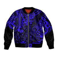 Unisex bomber jacket with blue Polynesian pattern, black sleeves and ribbed cuffs