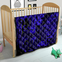 Polynesian patterned quilt blanket in navy blue and black for crib or toddler bed