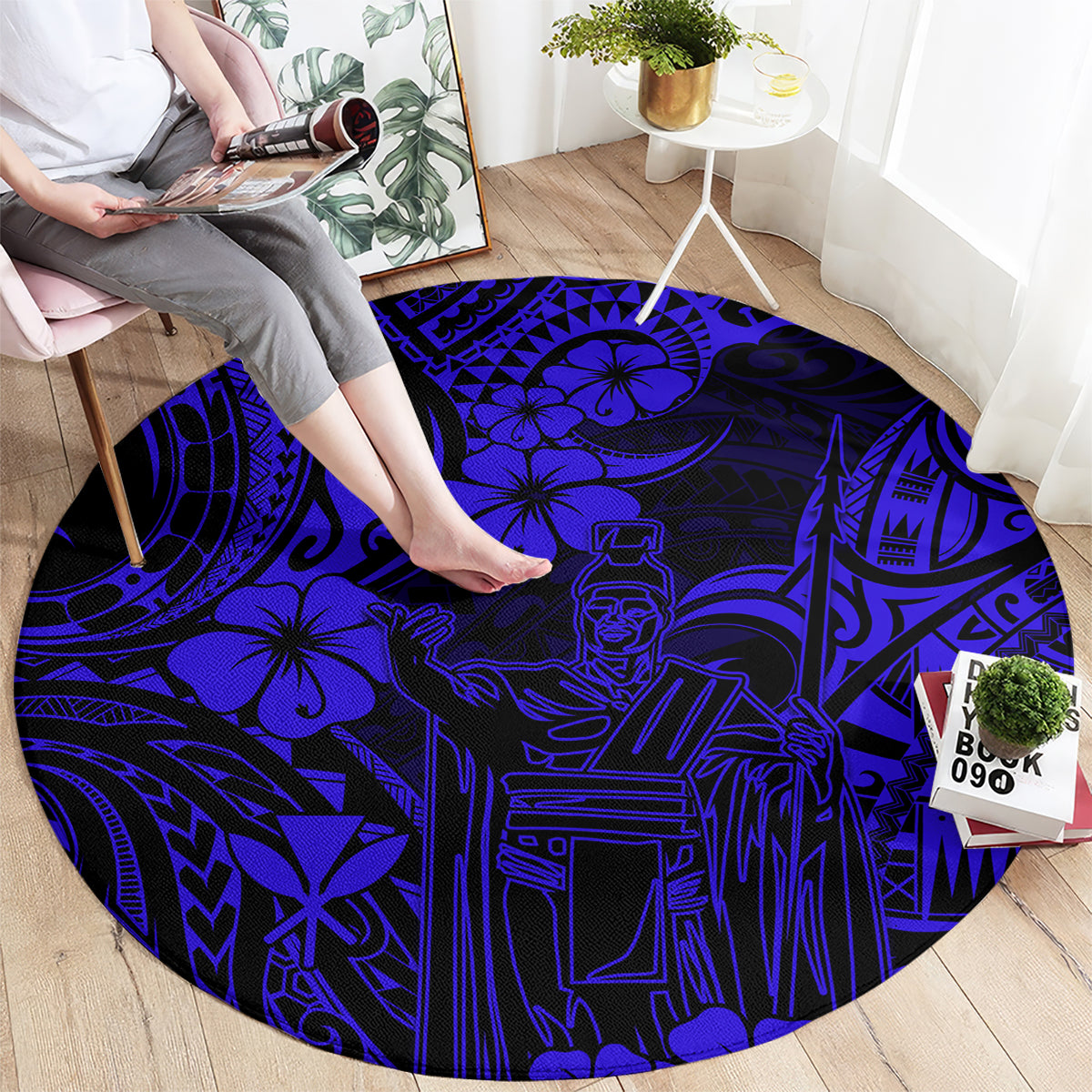 Round navy blue carpet featuring Polynesian figures and geometric motif pattern