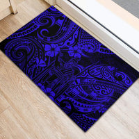 Navy blue Polynesian pattern rubber doormat with swirl, tiki motif, and flowers