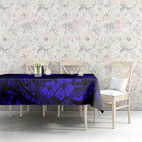 Navy blue Polynesian pattern tablecloth on table with floral motifs