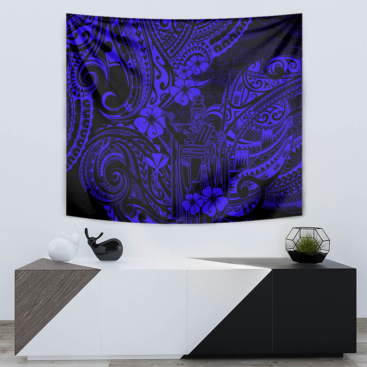 Navy blue tapestry showing swirling motifs, masks, and hibiscus-style flowers
