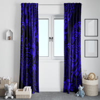 Set of navy blue Polynesian patterned window curtains on a double doorway