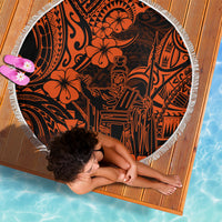 Orange circular Polynesian pattern beach blanket with white fringe, laid flat