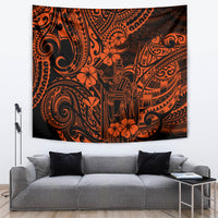 Orange and black Polynesian tapestry wall hanging with tribal masks, swirls, and hibiscus flowers