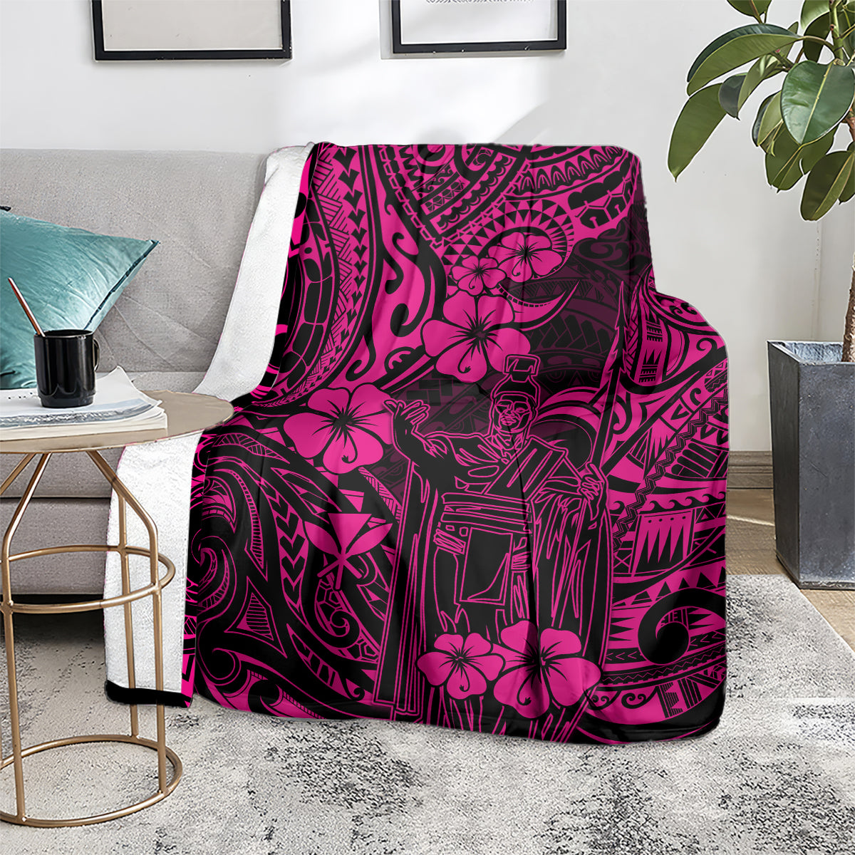 Pink and black Polynesian-pattern blanket, draped over chair back, bold motifs