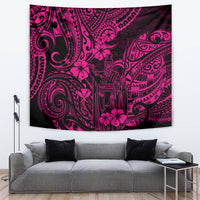 Pink Polynesian tapestry with dark patterned tribal artwork and floral accents