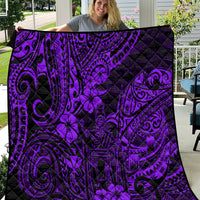 Purple and black Polynesian pattern quilt blanket with swirls and flower accents