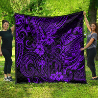 Purple and black Polynesian pattern quilt blanket spread outdoors