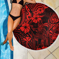 Red round beach blanket with bold Polynesian king Kamehameha pattern and white fringe
