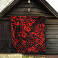 Red and black Polynesian-pattern quilt with bold swirling motifs