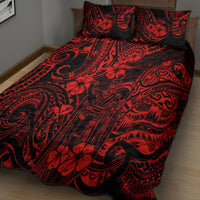 Red Polynesian quilt bed set with swirling motifs and two matching pillows
