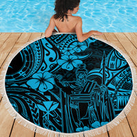 Round beach blanket with sky-blue Polynesian pattern and white fringed edge, laid flat