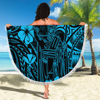 Round beach blanket with sky-blue Polynesian pattern and white fringed edge, held up