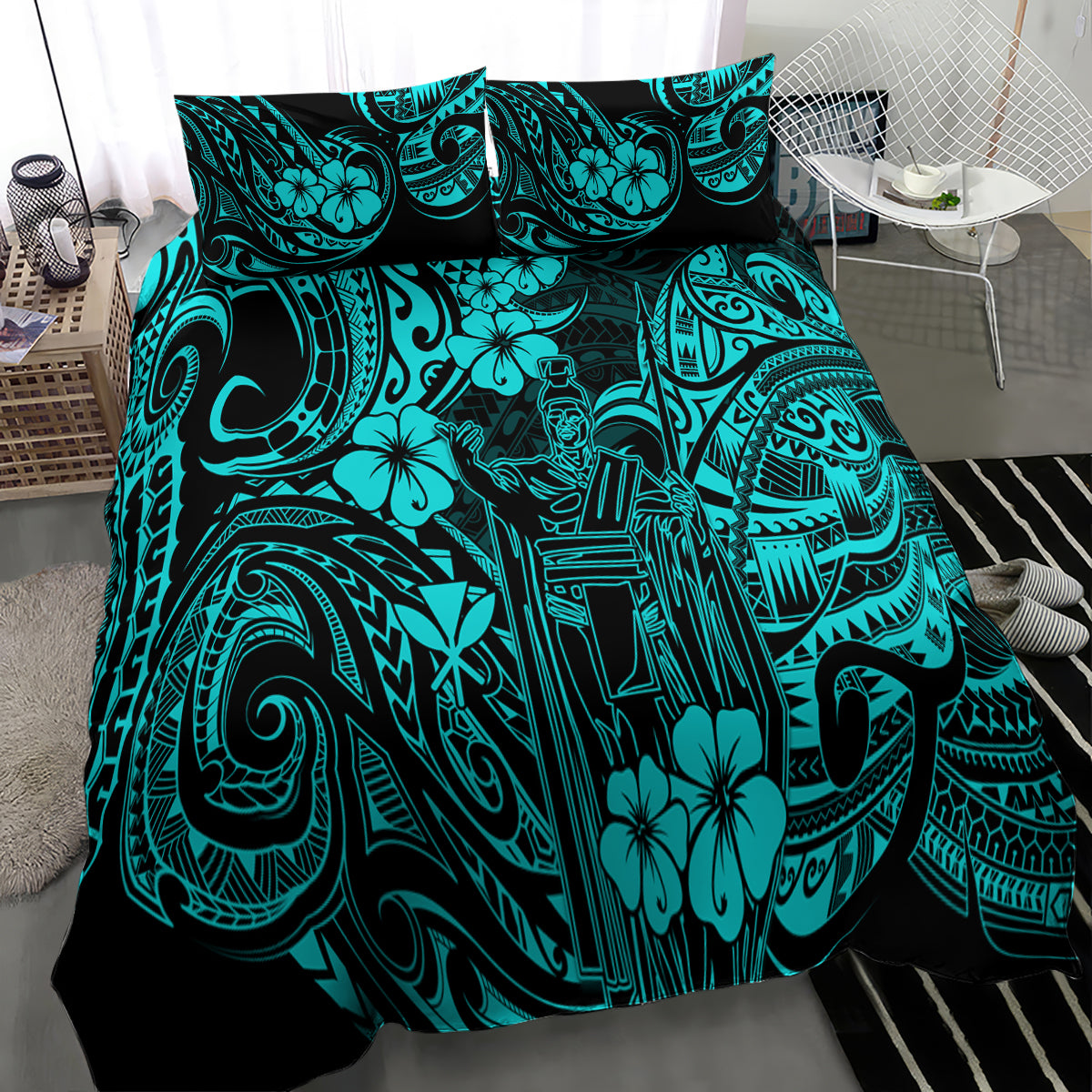 Turquoise and black Polynesian tribal patterned comforter on bed