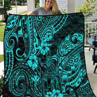 Turquoise Polynesian pattern quilt with black background and floral swirls, laid out flat