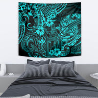 Turquoise Polynesian pattern tapestry featuring tiki figure and hibiscus flowers