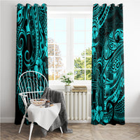 Turquoise patterned window curtain panels with dark tribal faces and floral accents
