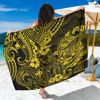 Yellow and black polynesian-pattern sarong with floral and swirl motifs, draped fabric