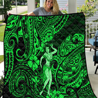 Green Polynesian hula girl quilt with swirling tiki patterns and shamrock motifs