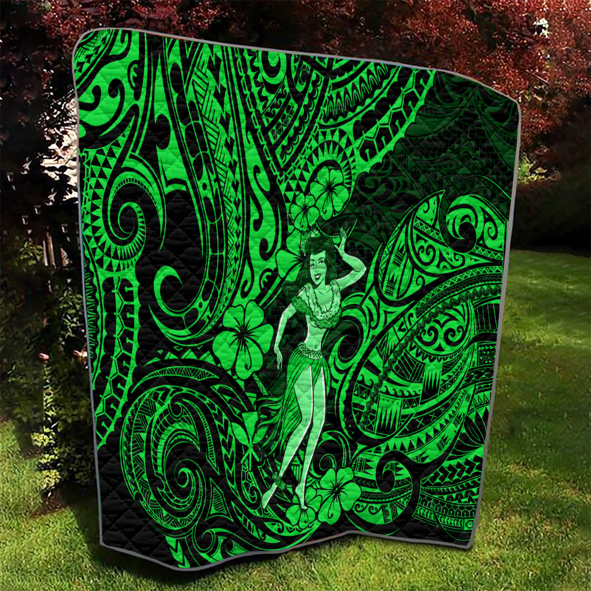 Green Polynesian hula girl quilt with ornate swirls and clover-like flower details