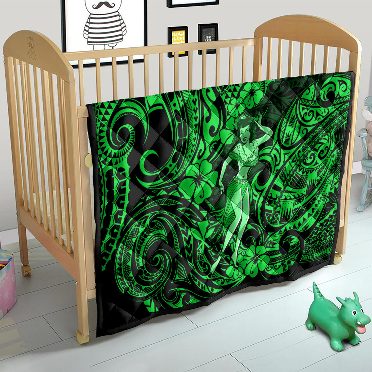 Green Polynesian hula girl quilt on a baby bed with swirling tiki and clover details