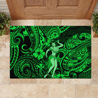 Green hula girl doormat with ornate tribal swirls and flower motifs at doorway.