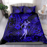 Navy blue hula girl bedding set on bed with matching pillowcases, swirl and flower motif