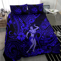 Navy blue hula girl comforter with bold Polynesian patterns and floral accents