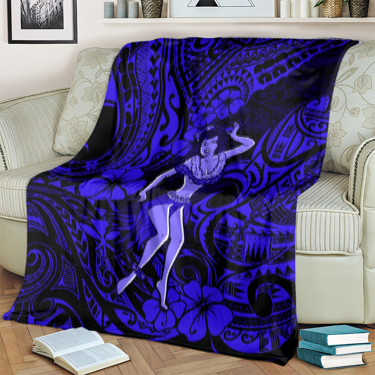 Navy blue Polynesian hula girl blanket covering a couch cushion, floral and swirl print