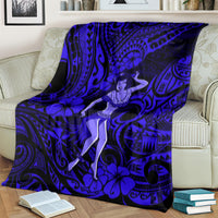 Navy blue Polynesian hula girl blanket covering a couch cushion, floral and swirl print