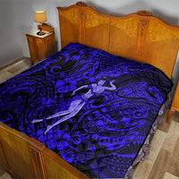 Hula girl quilt on bed, navy and royal blue tribal swirl and hibiscus floral print