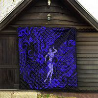 Hula girl quilt hanging on wooden wall, navy blue with spiral tribal designs