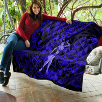 Hula girl quilt spread outdoors, navy blue tribal swirl pattern with hibiscus flowers