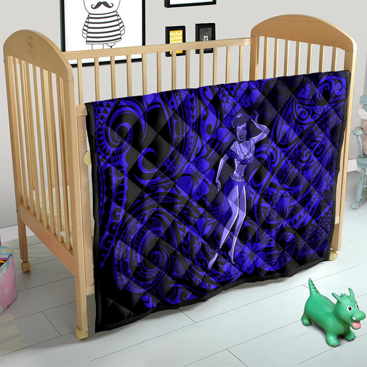 Hula girl quilt on wooden baby crib, navy blue tribal swirls with hibiscus blooms