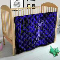 Hula girl quilt on wooden baby crib, navy blue tribal swirls with hibiscus blooms