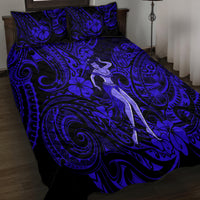 Navy quilt bed set with hula girl figure, swirling tribal and floral pattern, two pillows