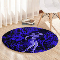 Navy blue round hula girl rug with large dancer figure and tribal wave motifs