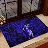Blue rubber doormat featuring hula dancer silhouette and Polynesian wave swirls