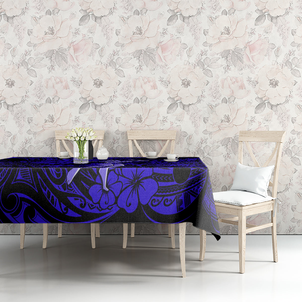 Navy blue tablecloth with Polynesian swirl and palm motifs on dining set