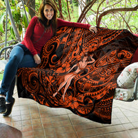 Orange and black Polynesian hula girl quilt draped and showing full motif