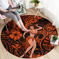 Round hula girl carpet with orange and black swirling Polynesian motifs and dancer graphic