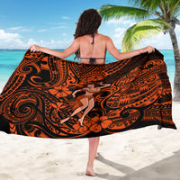 Orange and black patterned hula girl sarong, worn with tie at the back.